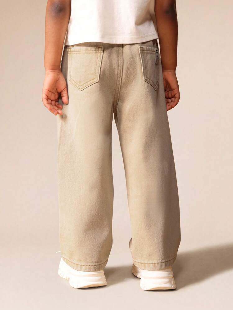 Jean kaki à jambes larges et taille haute