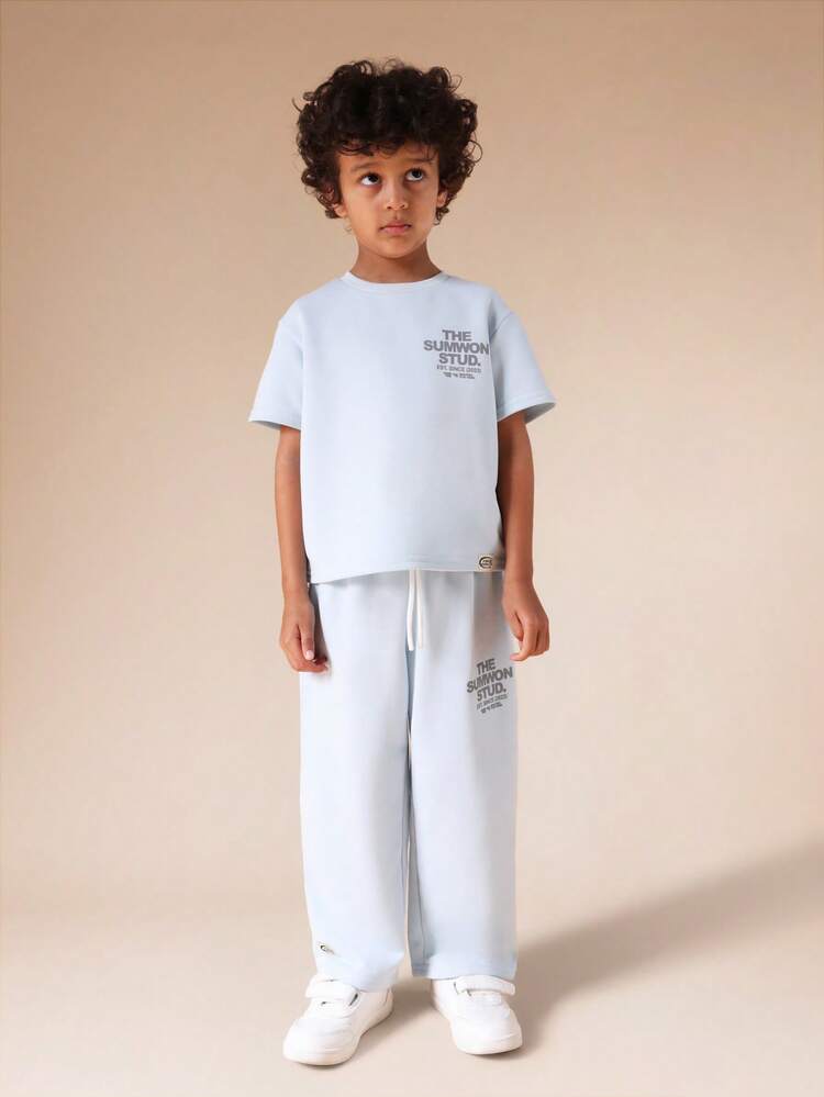 Ensemble t-shirt à col rond et pantalon de jogging avec imprimé texte