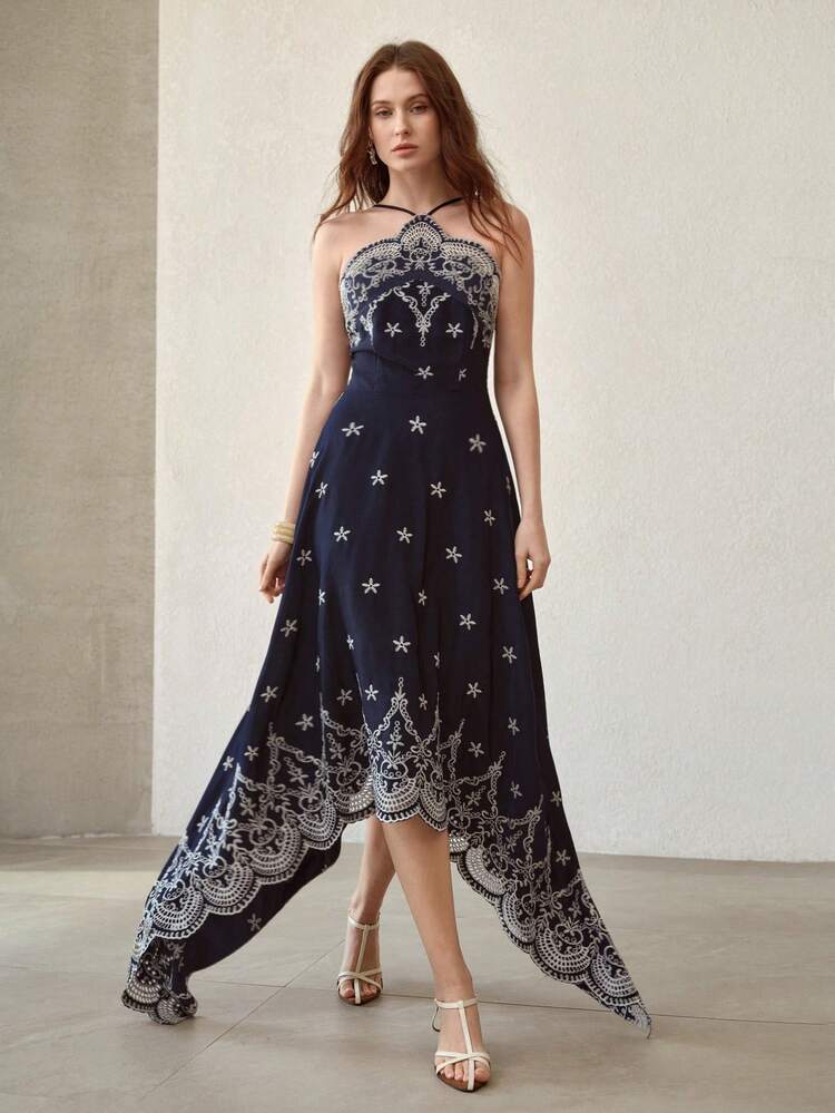 ネイビーブルーの刺繍入りアシンメトリーヘムミディドレス ホルターネック レディース