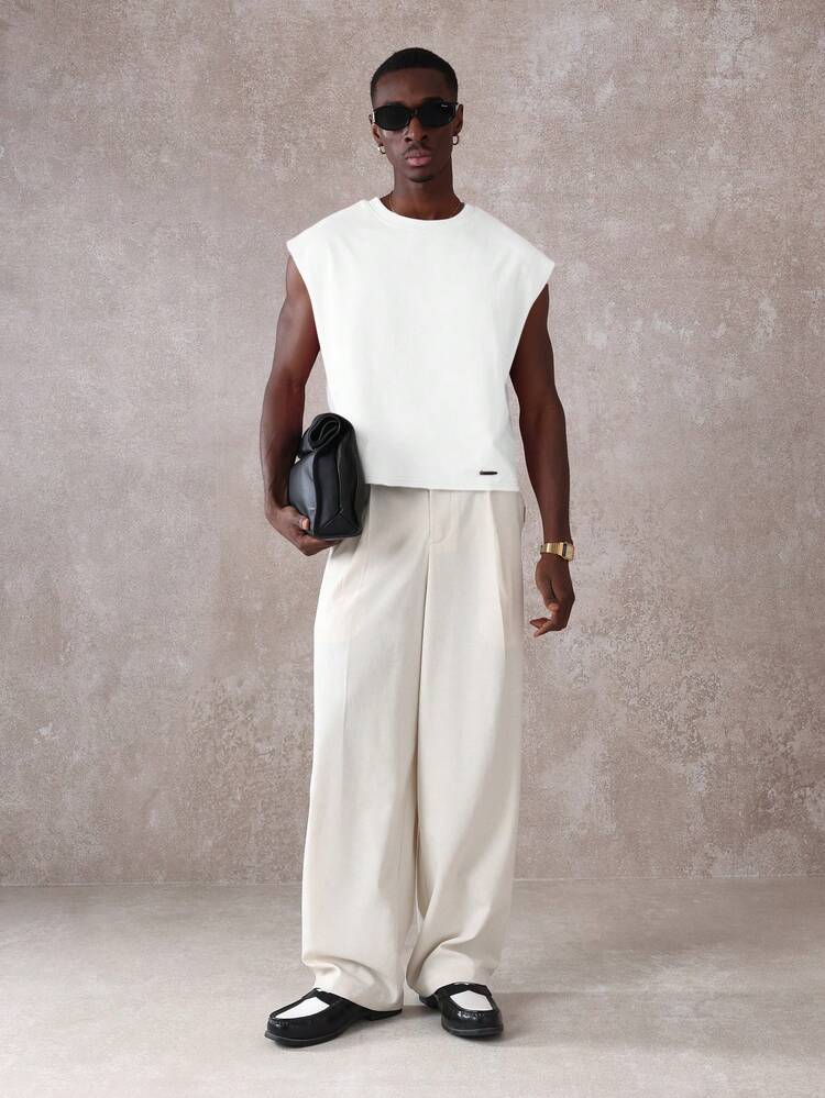 Canotta oversize da uomo con bordi grezzi e stampa grafica con slogan "Emotionally Unavailable", maglietta senza maniche con dichiarazione