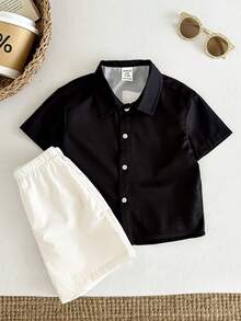 SHEIN Bộ 2 món cho bé trai/bé gái, gồm áo sơ mi ngắn tay in chữ và quần short cạp chun, thích hợp cho mùa xuân/hè, hoạt động ngoài trời và mặc dạo phố. - Đen và trắng - Xem 3