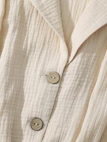 Franclia Soft Peach Textured Blazer Collar Jumpsuit, Short Sleeve Cinched Waist Wide Leg Cropped Pants, Versatile Commute & Date Outfit, Slimming Elegant Jumpsuit With Pleated Fabric, Refined Single-Breasted Blazer Collar Textured Wide Leg Jumpsuit - Apricot - View 4