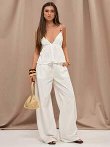 SHEIN BAE Bộ áo hai dây phối vải lanh pha, viền ren đính hạt và quần ống rộng cạp thấp có túi, thích hợp cho kỳ nghỉ ở miền Nam nước Pháp, kỳ nghỉ ở Ý, khu nghỉ dưỡng, bộ đồ vải lanh, bộ quần áo, bộ đồ đi biển, bộ đồ mùa hè. - trắng - Xem 8