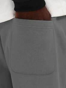 SUMWON Essential Flare Fit Jogger 运动裤，休闲舒适，适合日常穿着，采用抽绳腰带和阔腿设计，纯色款。 - 深灰色 - 查看 7