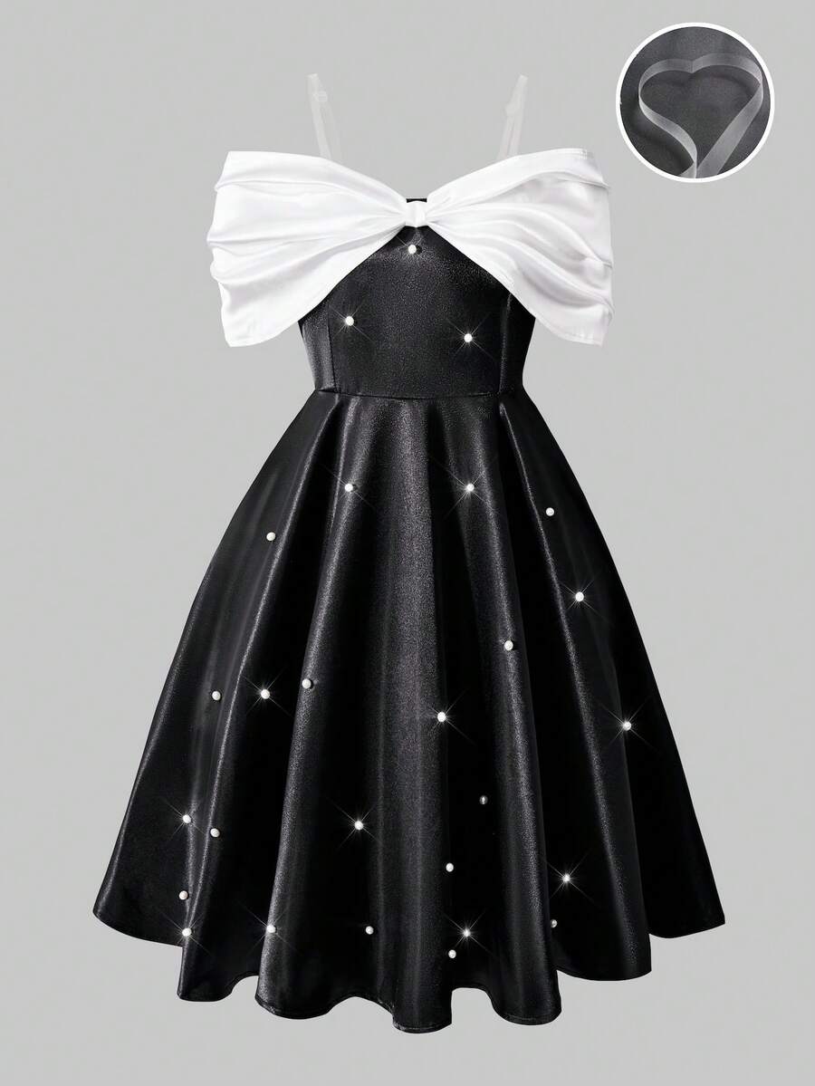 SHEIN 这是一款黑白相间的露肩A字连衣裙，专为少女设计。它采用透明可拆卸可调节肩带，胸前饰有白色弹力编织面料的褶皱设计，正面点缀珍珠。这款时尚独特的连衣裙适合室内外穿着、参加派对以及日常穿着，紧跟潮流。是春夏的理想之选。 - 黑色 - 查看 1