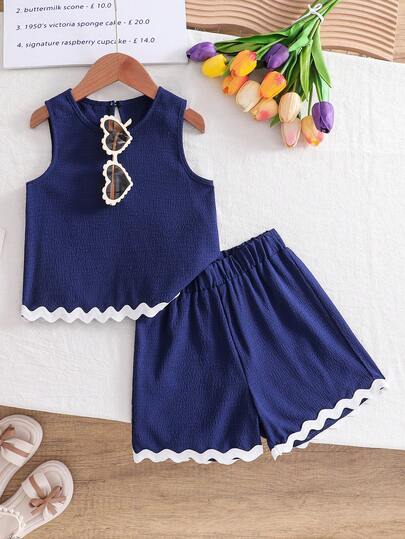 SHEIN Conjunto de top sin mangas con bajo contrastante de tela texturizada y shorts casuales para niña