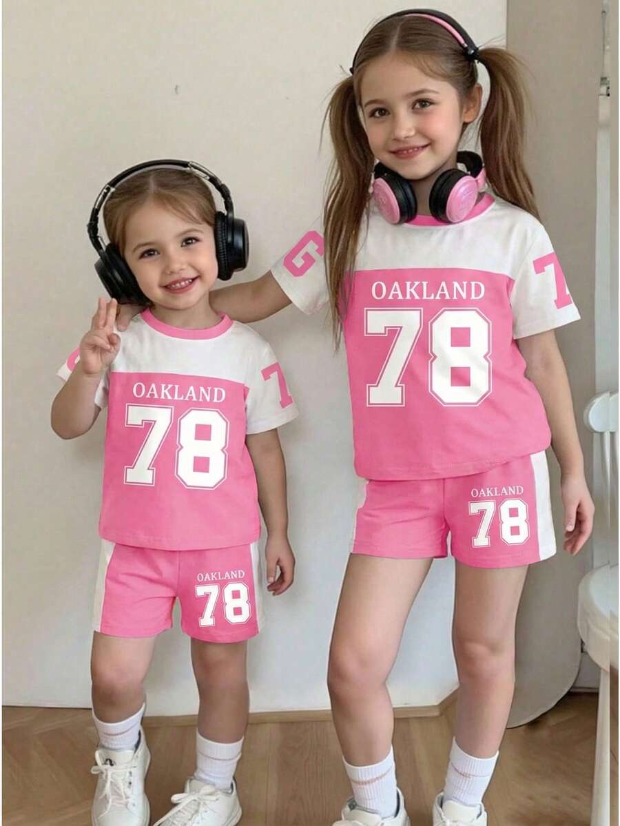 Baby Girls Sweet & Cute Printed Round Neck Short Sleeve T-Shirt And Shorts Set, Suitable For Parties And Gatherings. Featuring Fashionable Numeric 78 Print Round Neck T-Shirt Paired With Fuchsia And White Printed Shorts. Comfortable And Lightweight For Spring/Summer Seasons. Fashionable Casual Outfit For Outdoor Picnics, Street Photography, Campus, Festivals, And Gifts. - Hot Pink - View 1