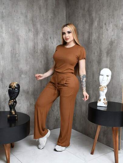 Conjunto  pantalón con línea + blusa corta 
 Tela acatalanada, cómoda