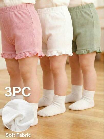 Souflis Souflis 3件套婴幼儿女童休闲宽松舒适短裤套装，柔软透气的镂空针织面料，弹性腰带配荷叶边，粉色和白色纯色，适合春夏居家及户外活动。
