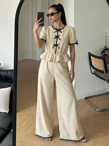 SHEIN ملابس علوية رقبة دائرية مع فيونكة ملونة وأكمام منتفخة وبنطلون واسع بخصر مطاطي مريح، طقم من قطعتين مناسب للعطلات والإجازات، للربيع والصيف - لون مشمشي - مشاهدة 15