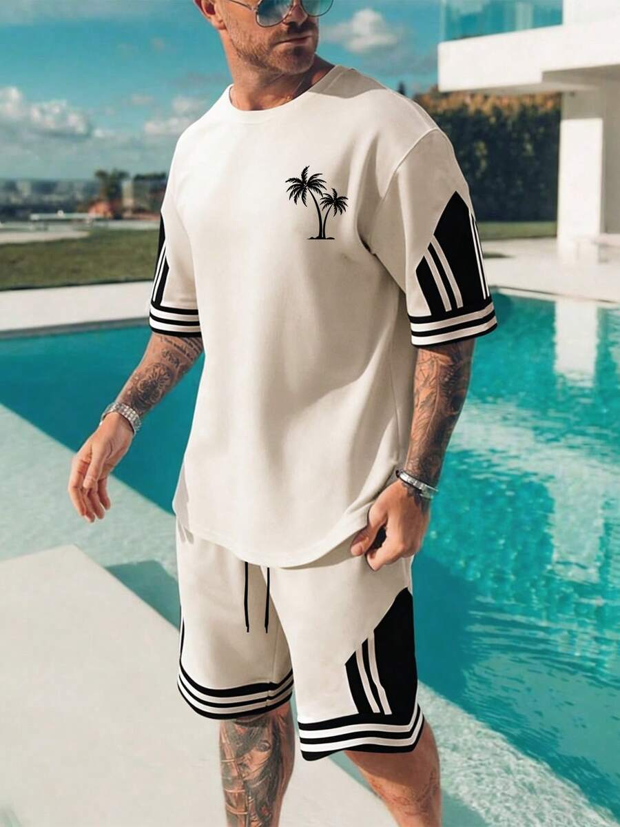 Manfinity RSRT 1. Bộ áo thun ngắn tay và quần short nam in hình cây dừa, bộ áo thun và quần short kẻ sọc phối màu phong cách thường ngày, thích hợp cho kỳ nghỉ. - Nhiều màu - Xem 1