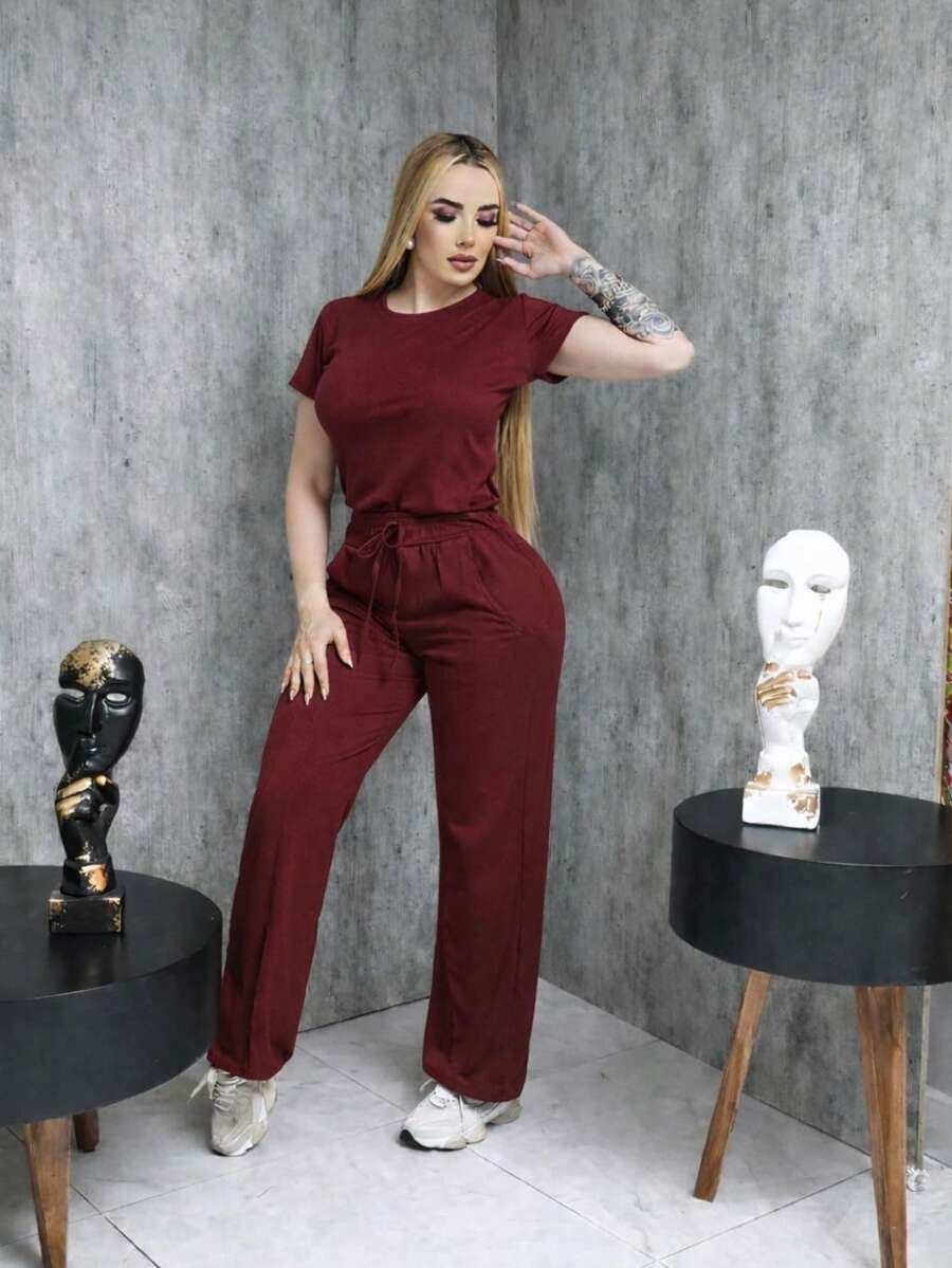 Conjunto pantalón con línea + blusa corta
Tela acatalanada, cómoda - Rojo violeta - Ver 1