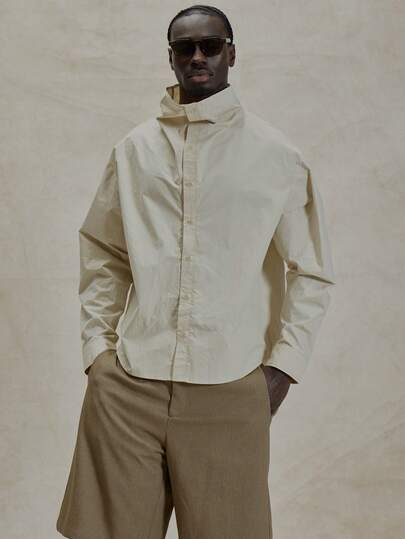 Musero Vestibilità rilassata, maniche lunghe, abbottonatura frontale, collo alto, dettagli invernali essenziali per stratificazione