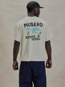Maglietta oversize a maniche corte, girocollo, con stampa grafica "MUSERO DEFINED BY DESIGN", elementi essenziali invernali - Albicocca - Visualizzare 1