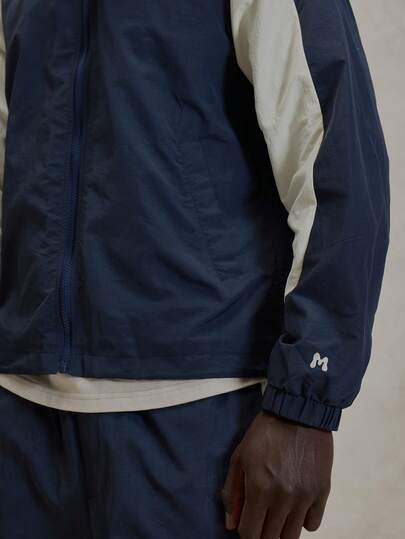 Musero Curved Panel Long Sleeve Nylon Zip Through Top Branded Cuff Detailing Bungee Cords Jacket Spring Summer Essentials