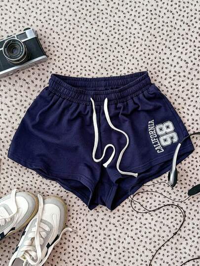 SHEIN Tween Girl Navy Blue Knit Drawstring Casual Cropped Top With Embroidered Number Design