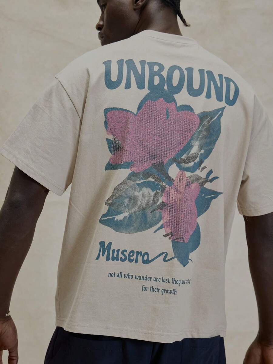 Short Sleeve Dropped Shoulder Oversized Crew Neck "UNBOUND MUSERO" Graphic Print Tshirt Spring Summer Essentials - Apricot - View 1