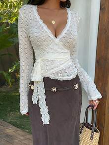 Sunnyshic Áo kiểu nữ cổ chữ V, chất liệu dệt kim, họa tiết hoa cúc, phối ren, thắt nơ phía trước, thanh lịch, gợi cảm, tay dài, hơi xuyên thấu, thích hợp cho kỳ nghỉ. - Màu be - Xem 5