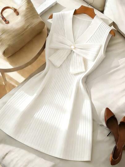 Franclia Vestido de punto con cintura ajustada y línea A, con cuello en V, sin mangas, con lazo y adorno de perlas, de unicolor, elegante y versátil para uso diario, tallas grandes, para primavera/verano. Vestido blanco con lazo, vestido blanco elegante, vestido blanco para brunch, vestido blanco vintage, vestido blanco de verano, vestido blanco casual para mujer, vestido de verano blanco para mujer, vestido blanco de tirantes para mujer