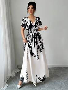 Elenzga V领收腰印花长裙，优雅迷人，适合春夏、秋冬四季穿着，也可作为音乐会、晚礼服、日常通勤、婚礼季/音乐节等场合的礼服。 - 黑與白 - 查看 3