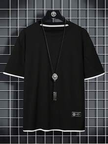 Manfinity Camiseta de manga corta con gráfico de color contrastante para hombres de talla grande - Negro - Ver 1