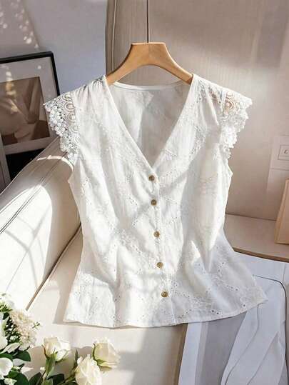 Franclia 2026 New Arrival Hollow Out White Textured Fabric Blouse: V Neck, Wooden Buttons, Lace Trim Patchwork, Flutter Sleeves - Ideal For Casual, Commute, Minimalist & Vacation Wear White Top White Eyelet Top Lace Top Eyelet Blouse Elegant Blouse Lace White Top Elegant White Blouse Eyelet Top For Women Lace Insert Blouse Women's Lace Top Elegant White Top White Eyelet Blouse