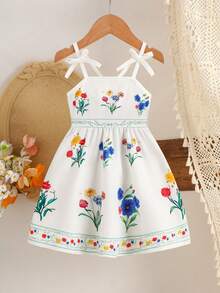SHEIN Vestido avental infantil com estampa floral, tecido leve e macio, alças com laço, estampa floral colorida, amarração na cintura, modelagem solta e fluida, ideal para piqueniques ao ar livre, brincadeiras no jardim e para a primavera/verão. - Branco - Ver 5