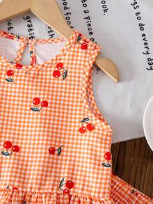 Sparklyn Conjunto informal de camiseta de tirantes con volantes y shorts con estampado de cerezas a cuadros para niña - Naranja - Ver 5