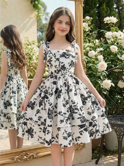 SHEIN 少女吊带蝴蝶结可爱优雅A字褶皱碎花网纱连衣裙，适合外出、聚会、春夏、度假等场合。