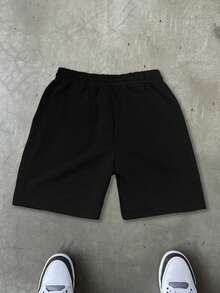 Manfinity EMRG Pantalones cortos negros de estilo callejero, de corte holgado y con bolsillos, para hombre - Negro - Ver 6