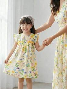SHEIN Vintaside Kids 女童春夏新款连衣裙，梭织纹理面料，可爱兔子数码印花图案，正面蝴蝶结装饰，无袖修身A字圆领连衣裙，适合可爱、俏皮、淑女的休闲穿着，日常、上学、外出、度假、派对等场合皆宜。迷人的女童黄色碎花印花短款A字下摆复活节连衣裙，带有荷叶边细节。迷人的儿童圆领荷叶袖黄色涤纶连衣裙，可爱植物图案，宽松短款荷叶边下摆，适合春季穿着。优雅的派对连衣裙。 - 黃色 - 查看 4