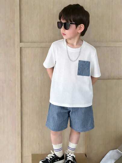 2pcs Young Boy Spring/Summer Casual Simple White Waffle Vertical Stripe Denim Pocket Decor Round Neck Short Sleeve Top Paired With Elastic Waist Vertical Stripe Washed Denim Shorts. Excellent Denim Washing Craftsmanship, Simple And Versatile Style, Suitable For Summer Wear, Showcasing Boy's Personalized, Fit For 4-7 Years Old Kids' Casual Daily Wear