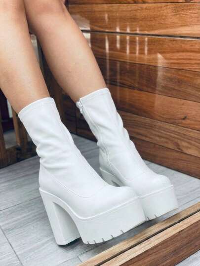 Botines elegantes para mujer de cuero sintético, con plataforma alta y tacón grueso.