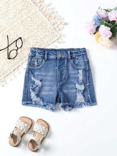 少女破洞牛仔裤，夏季新款休闲风，饰有猫须图案、膝盖破洞和毛边裤脚，弹力修身剪裁，适合日常出行、聚会和户外活动。