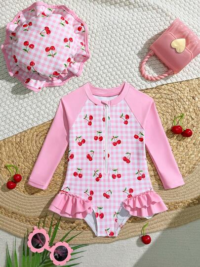 Sparklyn Baby Girls' Cute Elastic Pink Contrast Cherry Print Ruffled Long Sleeve 2 Pieces Swimsuit With Hat Baby Girl Cherry Swimsuit Baby Girl Bathing Suit Toddler Swimsuit With Hat Baby Ruffle Swim Toddler One Piece Swimsuit With HatAdorable Baby Girls Cherry Fruit Pattern Pink Swimsuit One Piece With Ruffles And Hat Beachwear Set