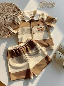 SHEIN 两件套男女通用婴儿服装，可爱夏季针织条纹卡通熊印花短袖T恤和松紧腰短裤，适合生日派对、锐舞派对、晚宴、演出、婚礼、宝宝满月、洗礼、一周岁生日庆祝、婚礼宾客、迎婴派对等场合。 - 彩色 - 查看 8