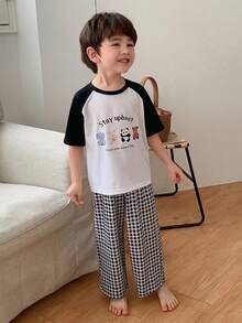 DAZY Young Boy Cartoon Print Round Neck Short Sleeve Top And Plaid Print Pants Pajama Set - White - View 1