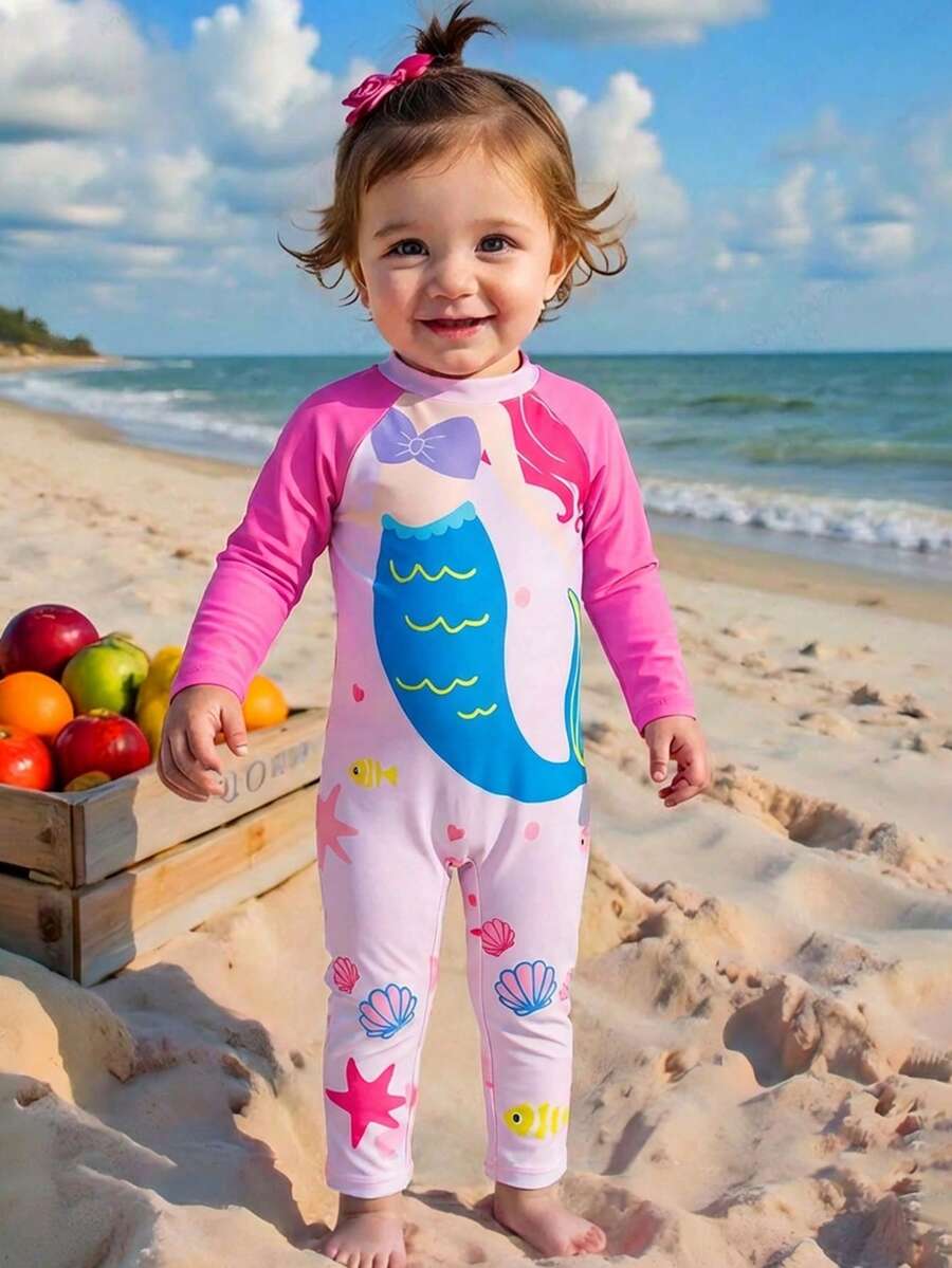 SHEIN 这款女婴连体长袖泳衣采用可爱百搭的美人鱼图案，非常适合休闲度假和春夏季节穿着。 - 彩色 - 查看 1