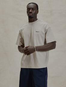 Short Sleeve Dropped Shoulder Oversized Crew Neck "UNBOUND MUSERO" Graphic Print Tshirt Spring Summer Essentials - Apricot - View 6
