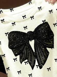 SHEIN 女婴可爱芭蕾舞风格迷你蝴蝶结印花，优雅黑色蝴蝶结图案，时尚简约休闲短袖圆领上衣，适合夏季穿着，可爱夏日，夏季单品，夏季外出必备，韩版风格，返校季，轻松舒适又时尚，春夏休闲装，印花上衣，夏季新款，春夏时尚 - 彩色 - 查看 6