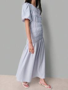 Nöista This Light Blue Striped Dress, Puff Sleeves, A Ruched Bodice With Smocking Details, And A Flowing Asymmetrical Shape. Women, Spring, Summer Outfit. - Blue - View 3