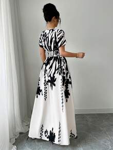 Elenzga V领收腰印花长裙，优雅迷人，适合春夏、秋冬四季穿着，也可作为音乐会、晚礼服、日常通勤、婚礼季/音乐节等场合的礼服。 - 黑與白 - 查看 2