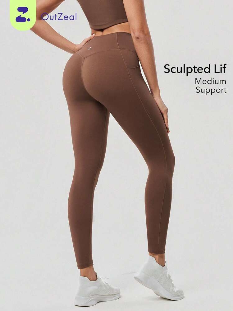 OutZeal 女士吸汗中度压缩交叉腰侧口袋紧身裤，适合日常健身和普拉提 - 棕色 - 查看 1