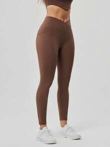 OutZeal 女士吸汗中度压缩交叉腰侧口袋紧身裤，适合日常健身和普拉提 - 棕色 - 查看 7
