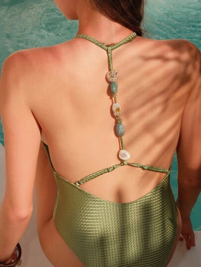 Swim Oasis 春夏两件套：针织提花无钢圈吊带露背泳衣和印花网纱半裙，高端度假套装