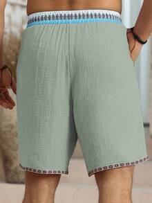 Genlund Quần short nam phong cách bohemian cổ điển, thích hợp mặc hàng ngày đi biển, được làm từ chất liệu giả lanh có họa tiết và dây đai, có thắt lưng co giãn, hoàn hảo cho kỳ nghỉ ở bãi biển Hawaii, các lễ hội âm nhạc và mặc hàng ngày, cũng là một món quà tuyệt vời cho bạn trai hoặc chồng của bạn. Quần short nam mùa hè có dây rút và tua rua, trang phục mùa hè cho nam, quần short nam, vải lanh mùa hè - Màu xanh lục của thợ săn - Xem 2