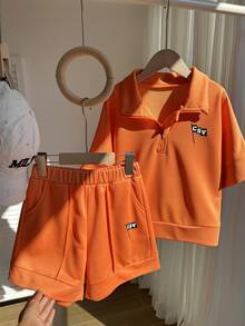 SHEIN Explorewe 2件套女童宽松Polo衫套装，休闲宽松拉链领Polo衫搭配口袋阔腿短裤，饰有字母印花，休闲运动学院风，舒适夏季套装 - 橘色 - 查看 3