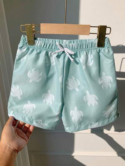 SHEIN Young Boy Casual Fashionable Cute Cartoon Turtle Print Loose Beach Shorts, Suitable For Summer, Beach, Outdoor, Swimming Toddler Boy Clothes   Summer Shorts