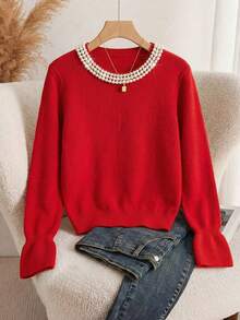 Franclia 这款优雅百搭的红色针织衫散发着浓郁的节日气息。它采用圆领设计，宽松版型，罗纹袖口呈喇叭状，领口处饰有多层珍珠。这款宽松的红色毛衣适合情人节、派对、周年纪念日以及日常穿着，是秋冬季节的理想之选。它优雅时尚，是节日派对、情人节和春季的完美之选。也适合作为女士优雅上衣和派对服饰。 - 紅色 - 查看 5