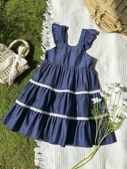 Vintaside Kids فستان أزرق فاتح بتصميم خط A لفتاة صغيرة في الصيف. الحافة المكشكشة لحزام الكتف تضيف لمسة ذكية وجميلة، مما يزيد من الحلاوة والطبقات الإجمالية. مناسب للعب على الشاطئ في العطلات، والخروج، والراحة المنزلية، والزفاف، وعيد الميلاد، وحفلات الأداء وغيرها من المناسبات